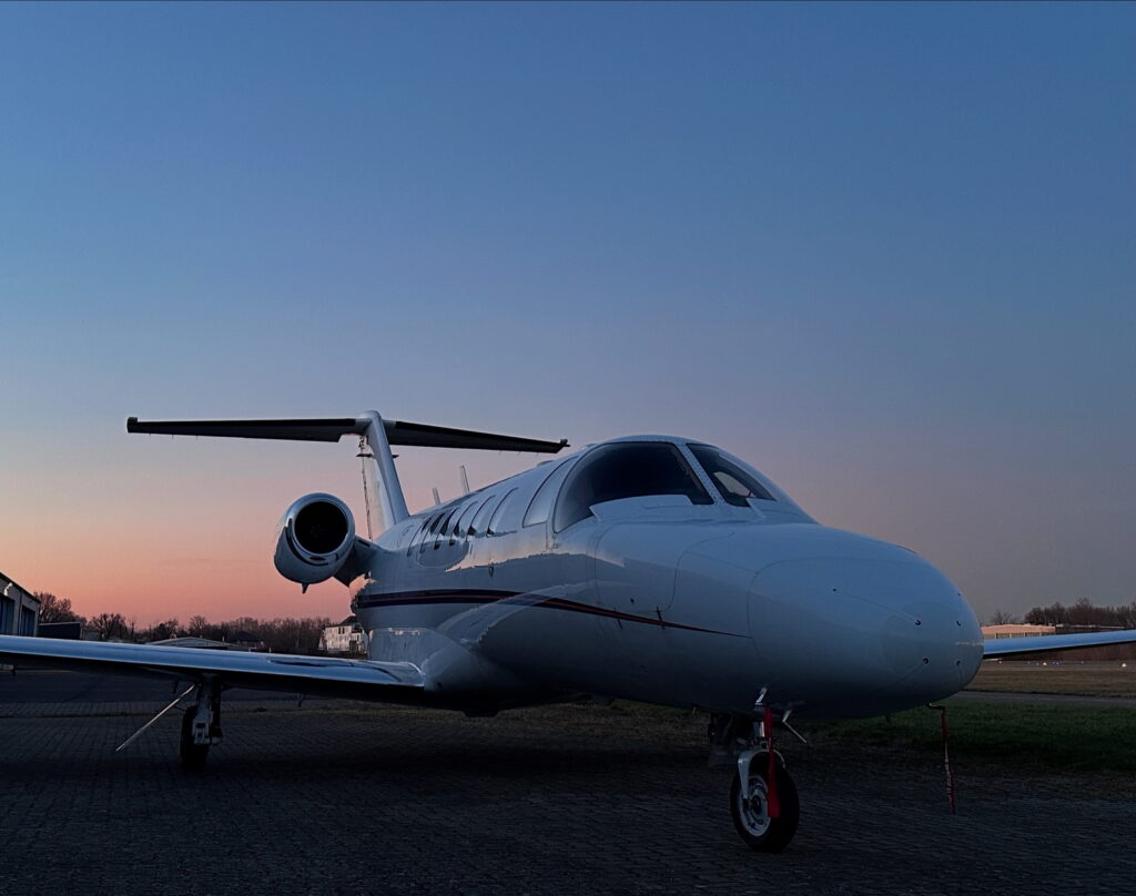 A Cessna Citation CJ2 parked for the night captured in the evening dusk