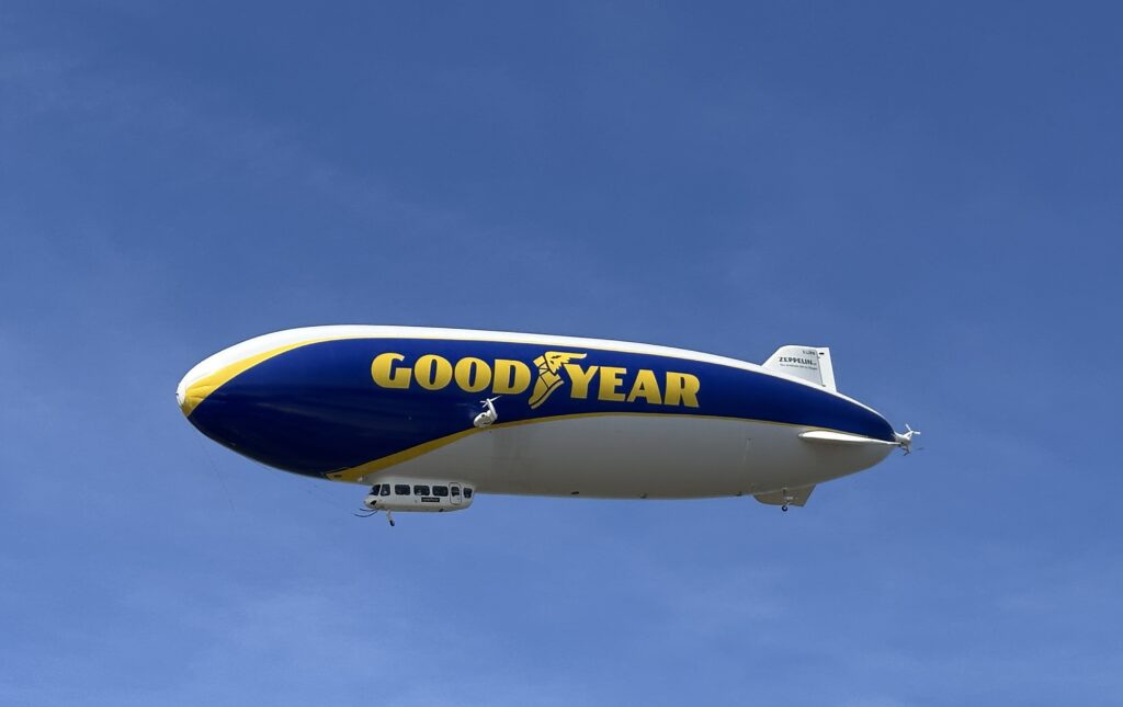 The Good Year Airship in the bright blue sky