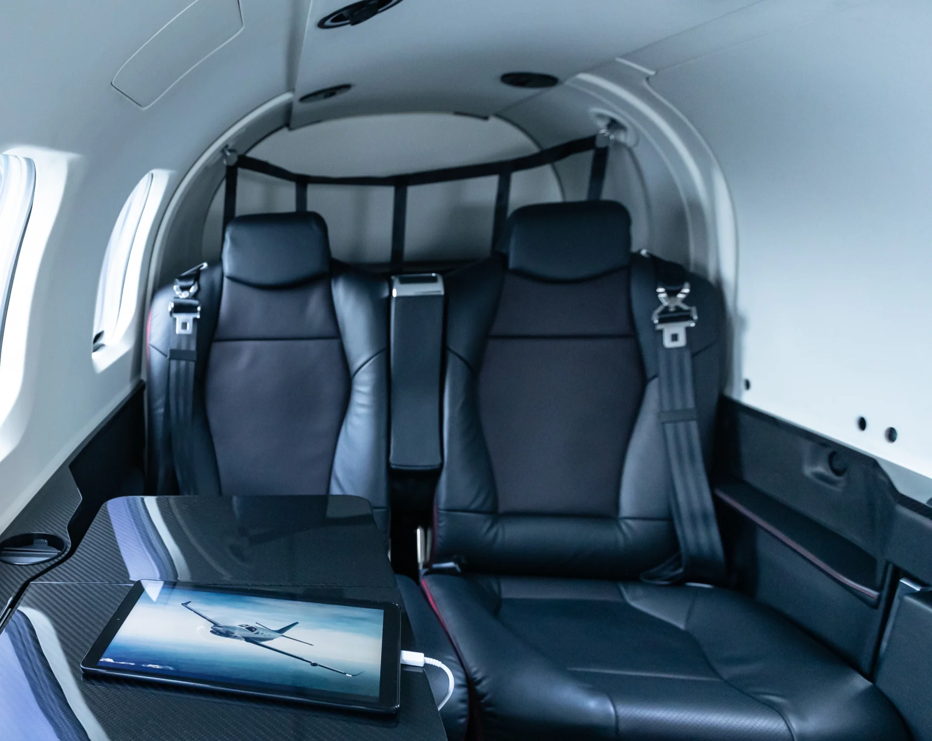 Daher TBM 960 Interior. Black leather and red trim