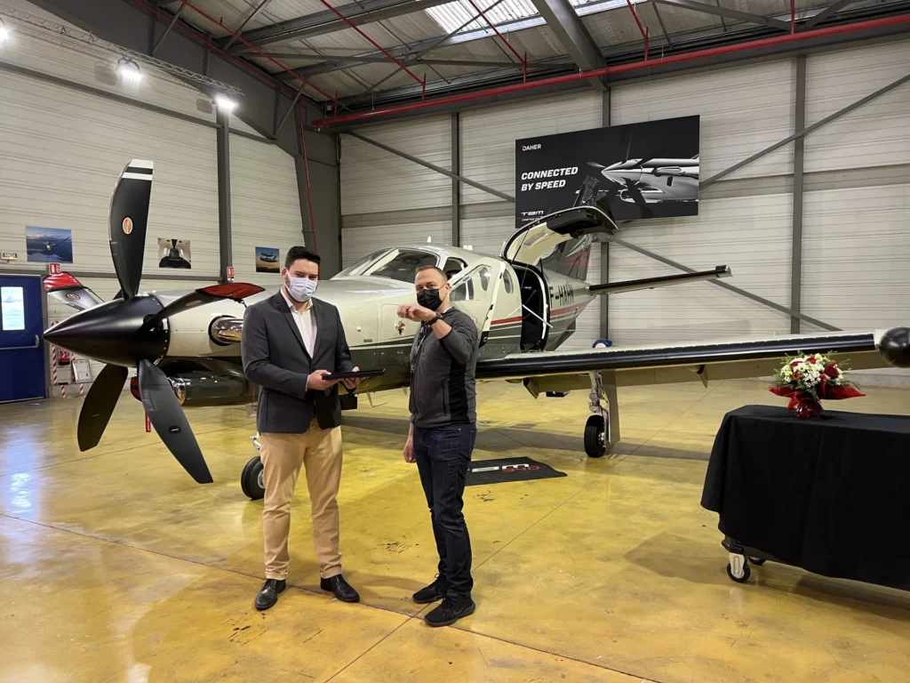 The keys for a brand new TBM 940 is handed over to the new owner. 